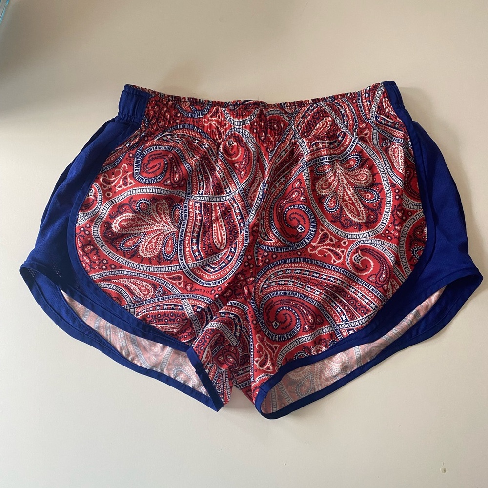 red and blue Nike Dri-Fit shorts